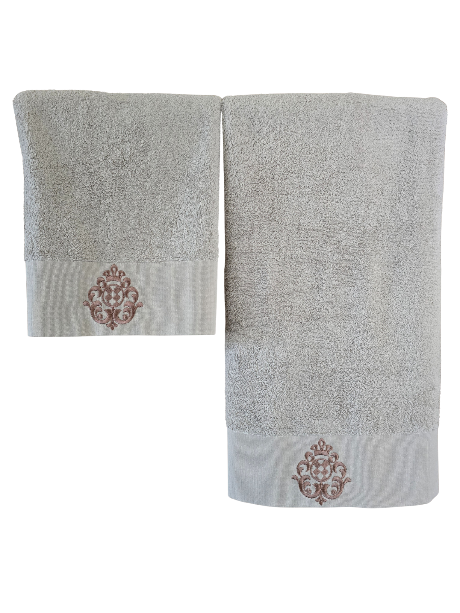 Two gray towels with  decorative patterns on a white background